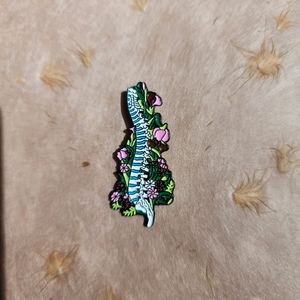 ANATOMICAL FLORAL SPINE ENAMEL PIN